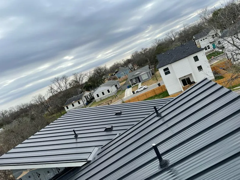 Standing seam metal roof panels with vents for Skylight Repair in McHenry